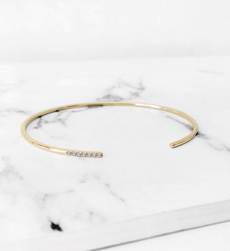 solid yellow gold thin cuff bracelet with diamonds from Whisper Gold Bracelets collection