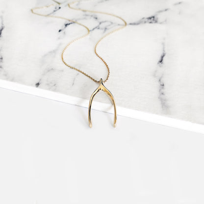 14k yellow gold wishbone pendant necklace