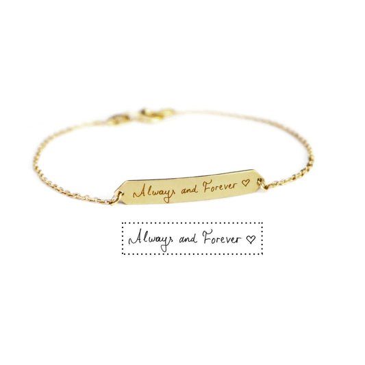 14k gold personalized bracelet with a hexagon bar engraved with custom handwritten message