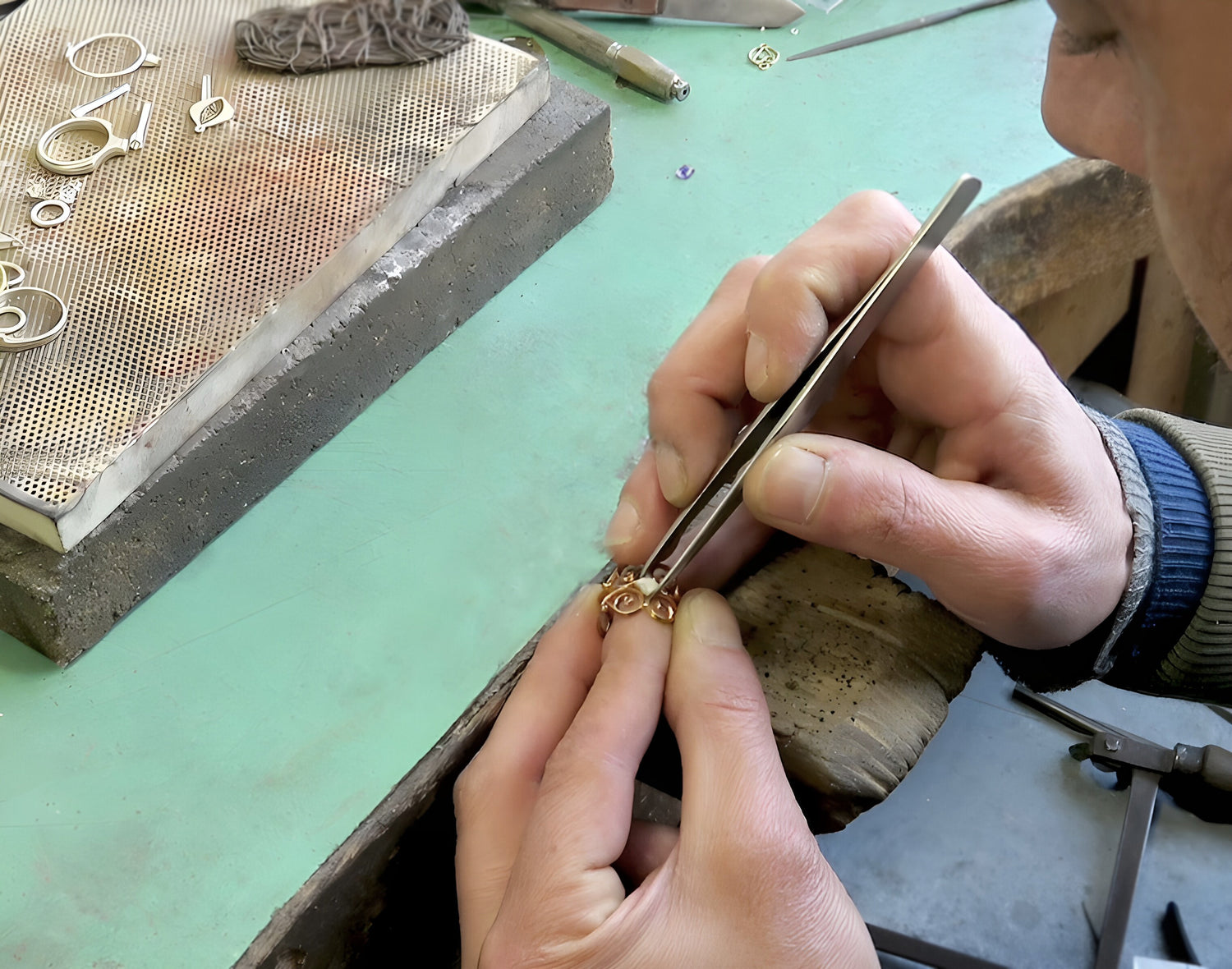 goldsmith working on a ring