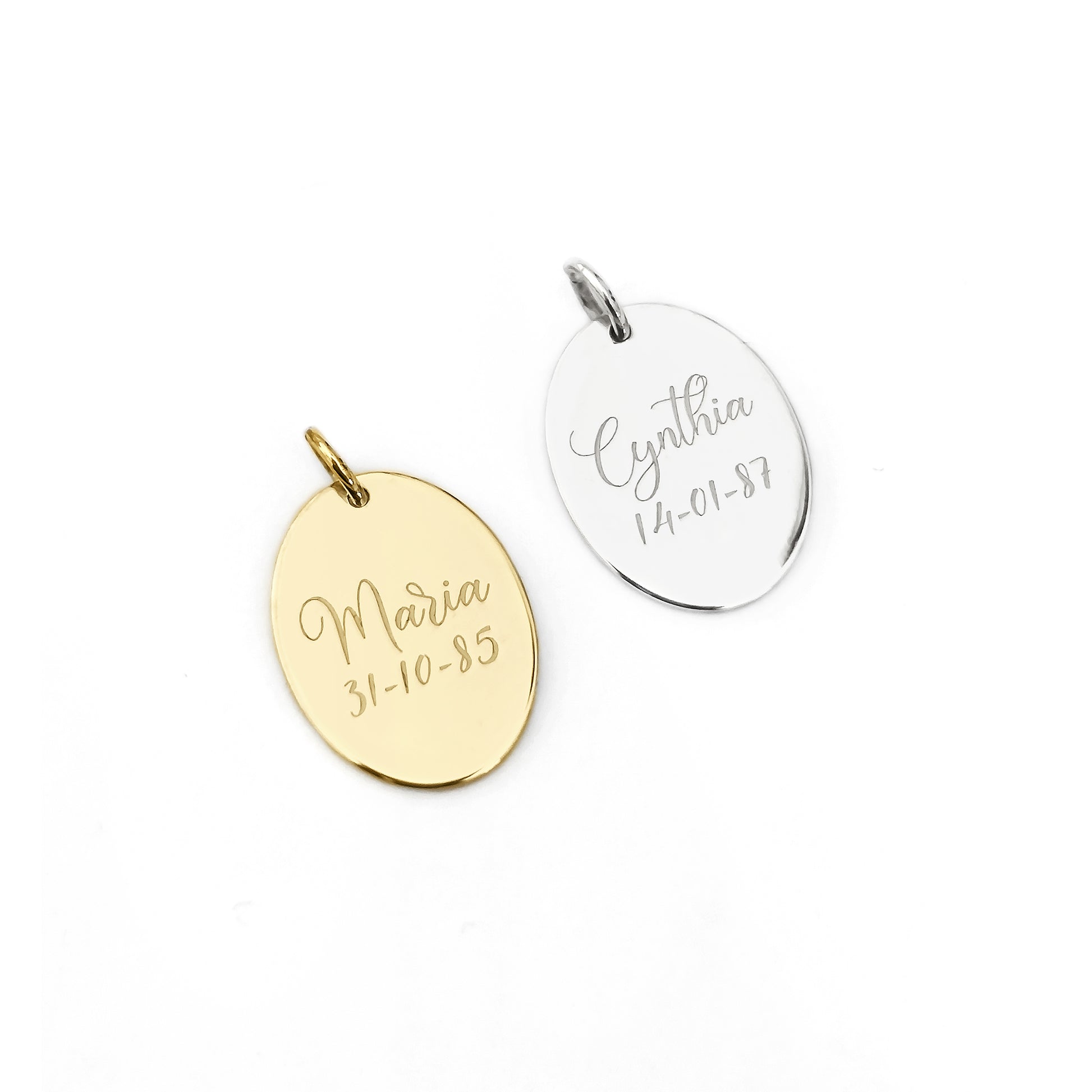 customization example solid white and yellow gold pendants engraved with a name and date of birth on the back