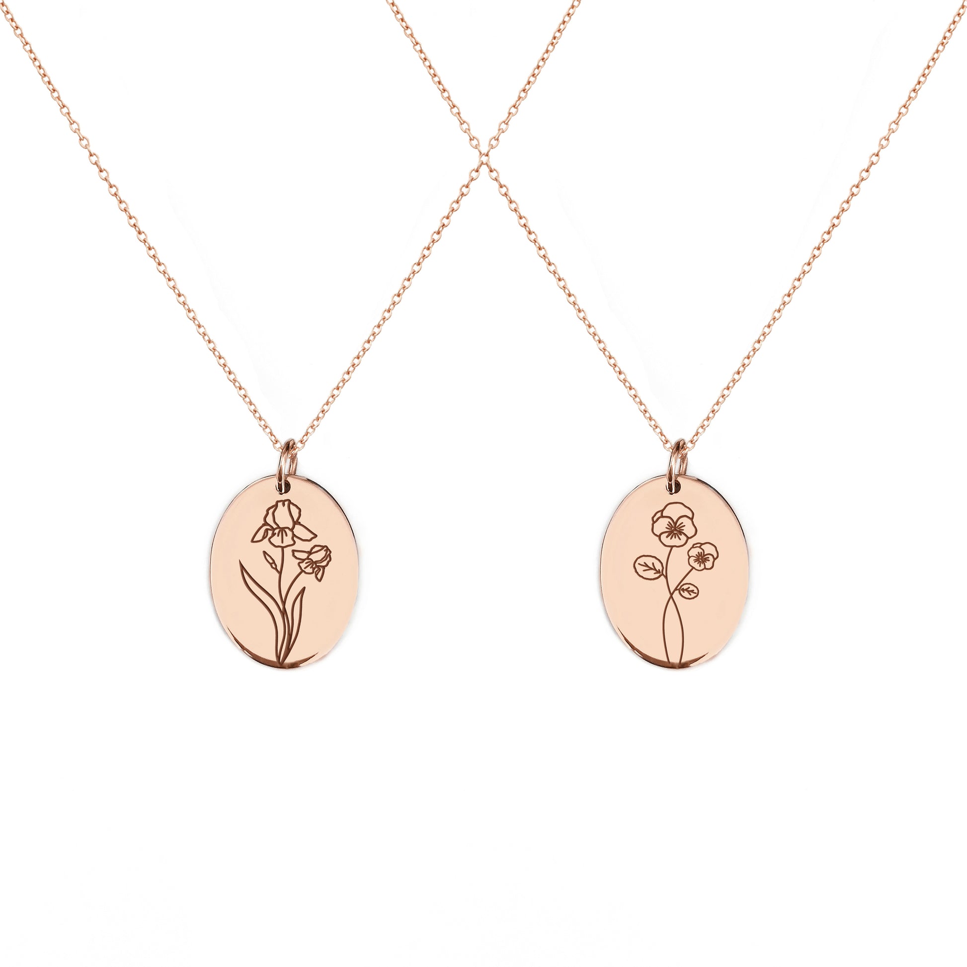 two solid rose gold oval pendant necklaces engraved with the birth flowers of February Iris and Violet