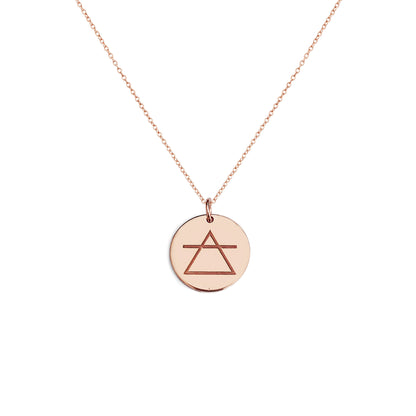 solid rose gold necklace with a 14mm disc pendant engraved with the air element