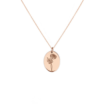 solid rose gold oval pendant necklace engraved with a Marigold the birth flower of October