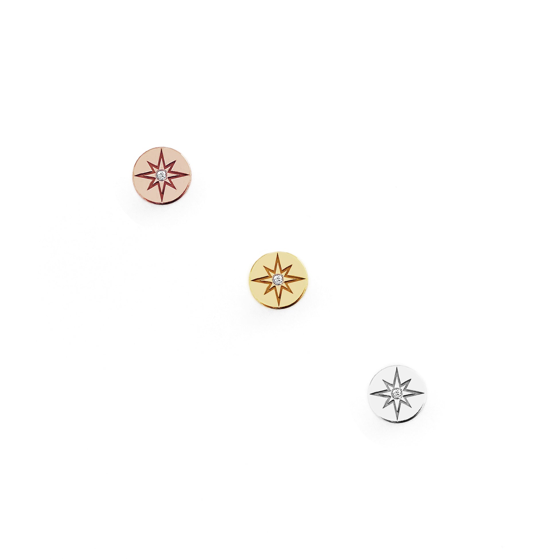 solid yellow rose and white gold north star disc stud earrings set with a tiny diamond in the center