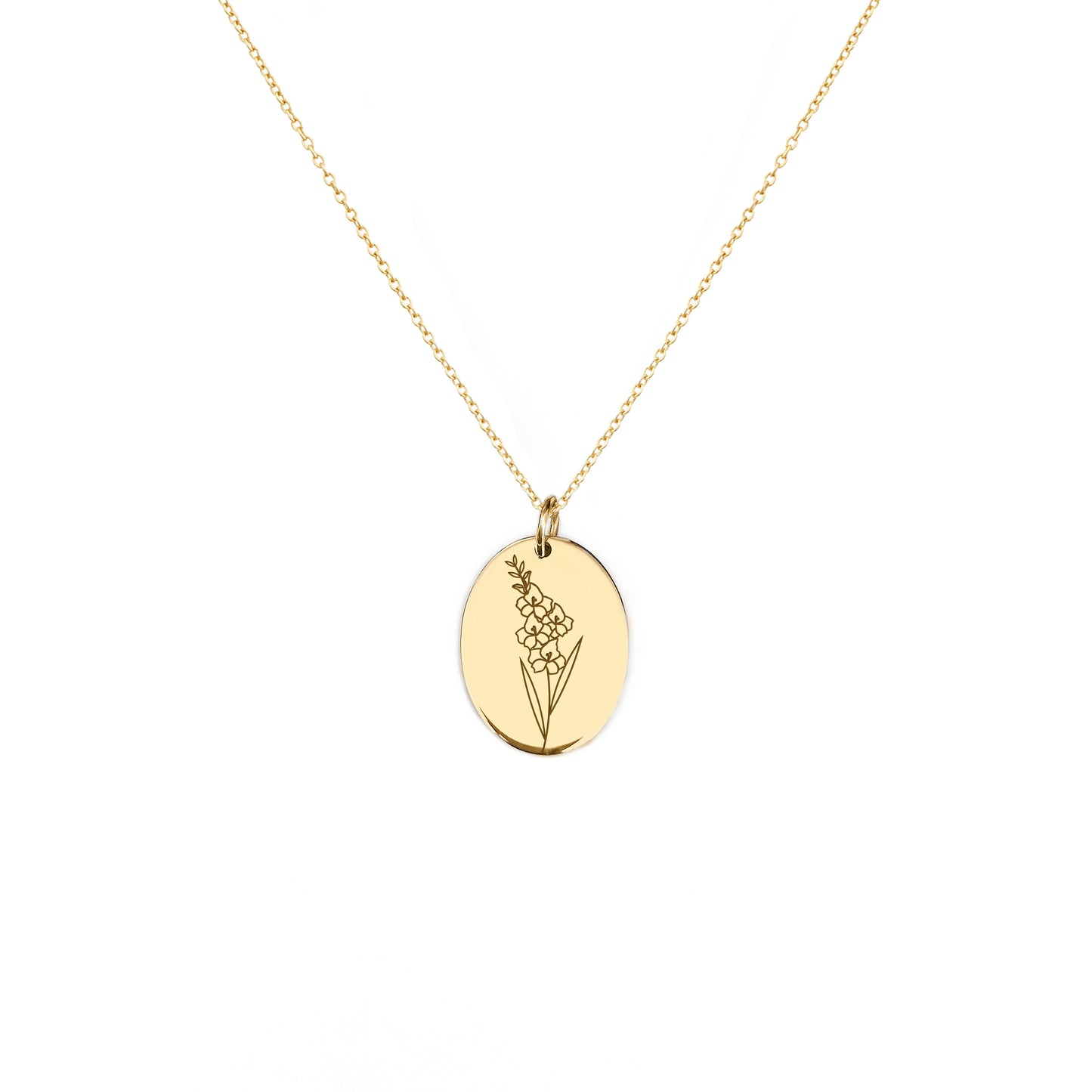 solid yellow gold oval pendant necklace engraved with a Gladiolus the birth flower of August